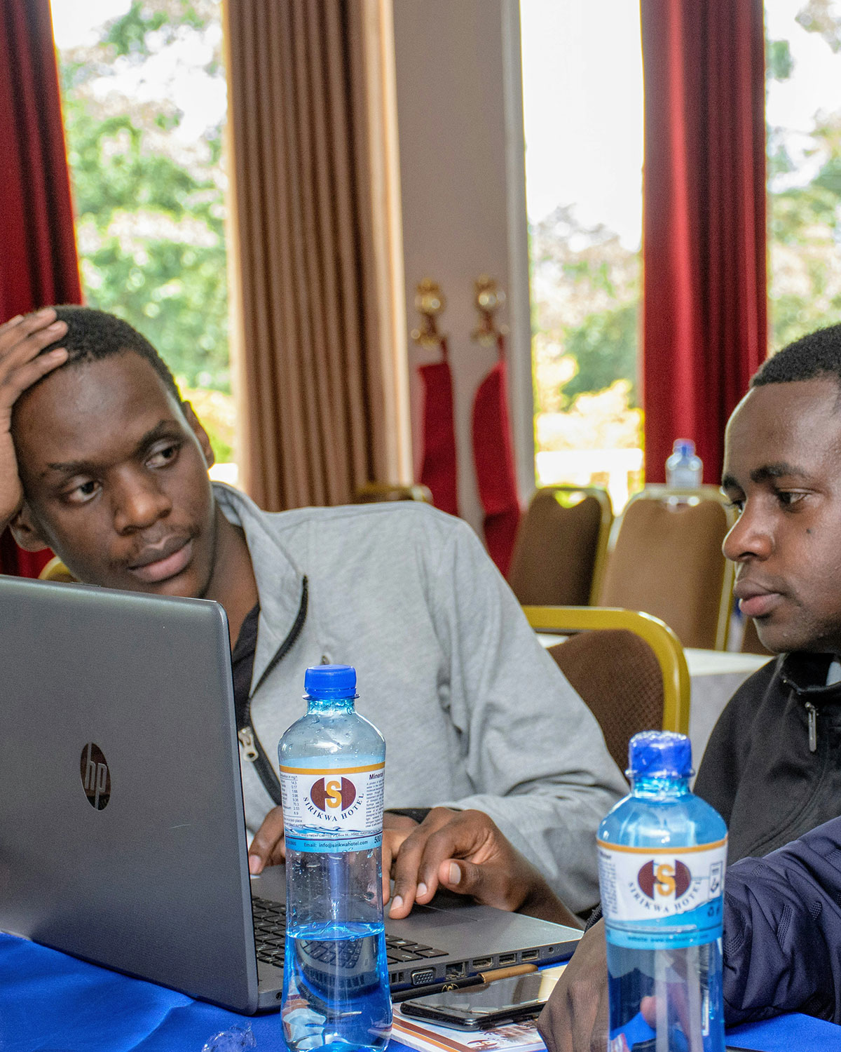 Two guys on a computer