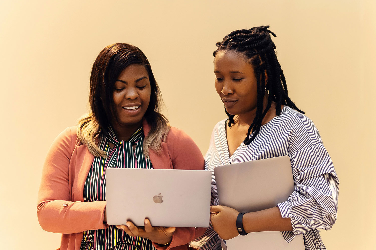 Lady and Girl viewing computer screen